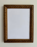 Twisted wood frame with boarder