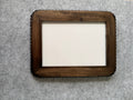 Dark wood bobbin frame